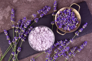 Lavender bath salt with fresh lavender flowers. Flat lay.