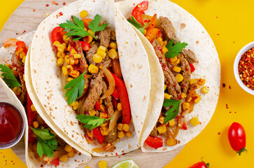 Mexican Tacos with Beef and Vegetables, Tacos al Pastor on Yellow Background