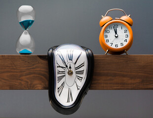 Molten clock, alarm clock and hourglass	