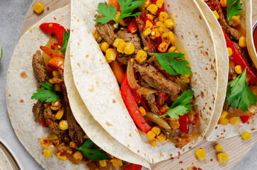 Mexican Tacos with Beef and Vegetables, Tacos al Pastor on Grey Background