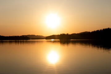 Fototapeta na wymiar Magical sunlight by the lake