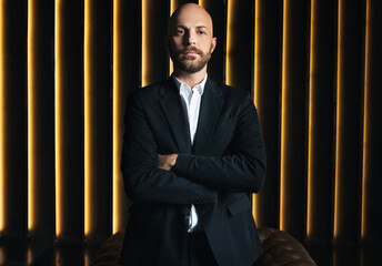 Successful Businessman Standing Posing With Confidence In Luxury Dark Office