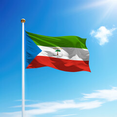 Fototapeta na wymiar Waving flag of Equatorial Guinea on flagpole with sky background.