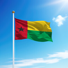 Fototapeta na wymiar Waving flag of Guinea-Bissau on flagpole with sky background.