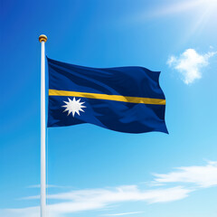 Waving flag of Nauru on flagpole with sky background.