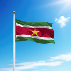 Fototapeta na wymiar Waving flag of Suriname on flagpole with sky background.