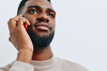 Obraz premium black man trendy businessman smile mobile young phone happy technology african