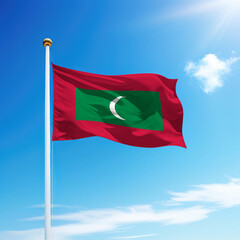 Waving flag of Maldives on flagpole with sky background.