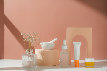 Skincare set including serum and sunscreen for summer and moisturizer skin. Cosmetic and beauty concept.