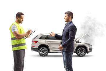 Driver explaining a car problem an a road help agent writing down a document