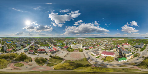 aerial hdri 360 panorama view from great height on buildings, churches and center square of provincial city in equirectangular  seamless spherical  projection. may use as sky replacement for drone © hiv360