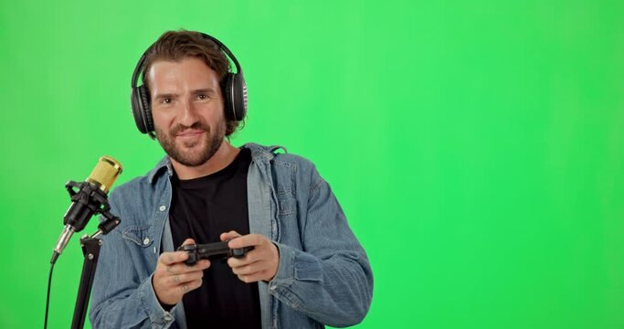 Live streaming, gaming and face of man on green screen for social media, technology and influencer. Mockup, podcast and microphone with portrait of male gamer on studio background for games vlogger