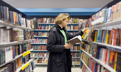 Obraz na płótnie Canvas bookstore,.buying a book in a store