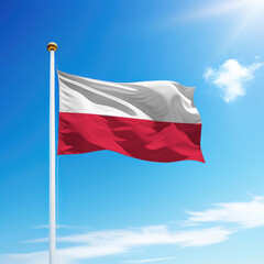 Waving flag of Poland on flagpole with sky background.