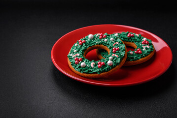 Beautiful bright colorful homemade gingerbread cookies on a ceramic plate