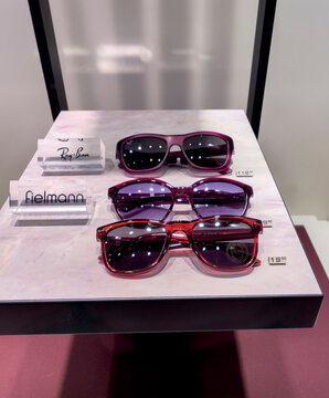 Rayban sunglasses displayed in a Fielmann store window. Ray-Ban is a brand of sunglasses and eyeglasses founded in 1937 by the American company Bausch and Lomb