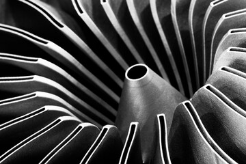 Steel blades of turbine propeller 3D printing. Close-up view. Selected focus on foreground,...