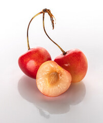 cherry on a white background with reflection
