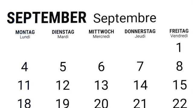 Time lapse zoom in motion of calendar month of September in german and french