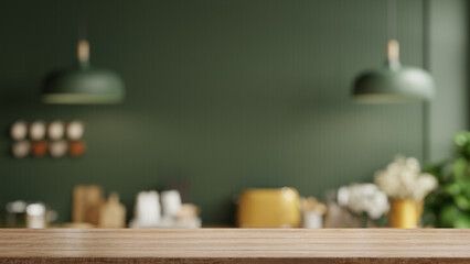 Wooden table top on blur kitchen room background,Modern Contemporary green kitchen room interior.