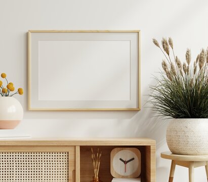 Mockup poster frame close up and accessories decor in cozy white interior background.