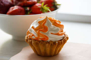 basket with whipped cream and a plate with fresh strawberries. set . selective focus