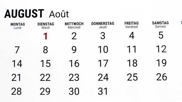 Time lapse zoom out motion of calendar month of August in german and french