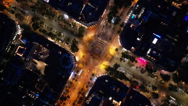 Central areas of Barcelona at night. Top view, filming from a drone.