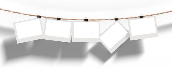 Three empty photo frames 16X9 for your design. Photo frames hang on a rope, fixed with stationery clothespins.