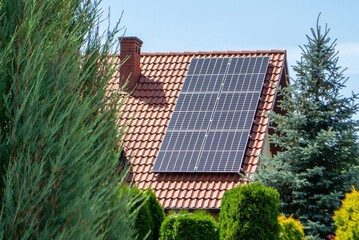 House roof with photovoltaic modules