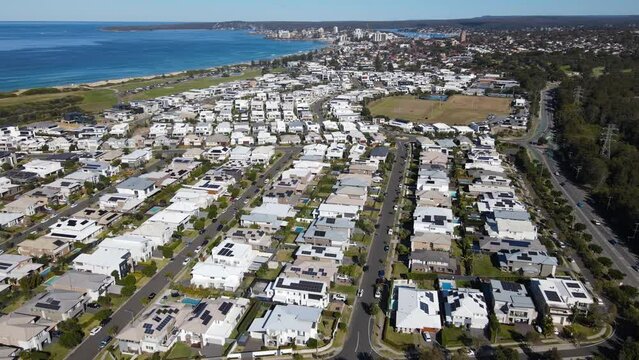 Aerial drone view of Cronulla in the Sutherland Shire, Sydney, NSW Australia looking in the south direction on a sunny day in June 2023 