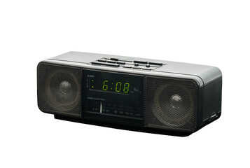 Old stereo alarm clock radio isolated with cut out background.
