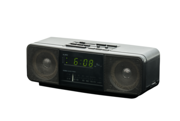 Old stereo alarm clock radio isolated with cut out background.