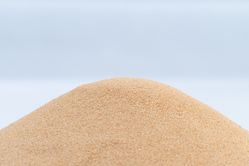 Small size fine Sand flying pile, Golden grain like glass. Abstract silica material set. Yellow colored sand close up detail texture. White background Isolated