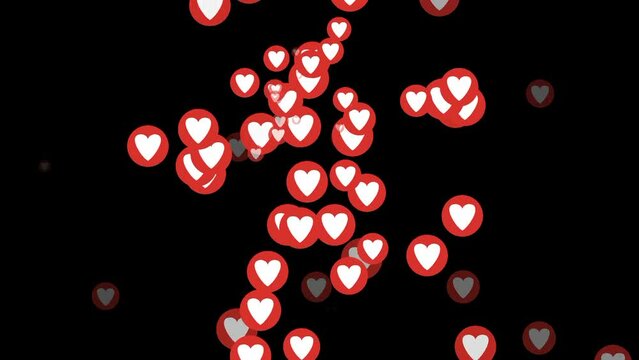 Red heart isolated on black background moving like fireworks 4k footage. Heart on black screen.