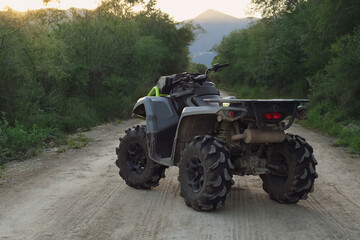 Modern fast quad bike on pathway outdoors