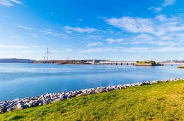 view of windmill across river in Cork