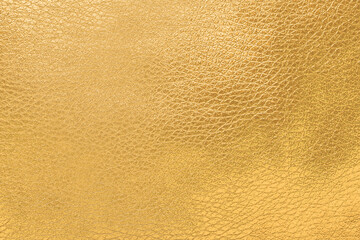 Closeup view of shiny golden surface as background