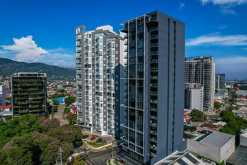 Beautiful aerial view of the Sabana Park in San Jose Costa Rica, and its Skyscrapers, next to the...