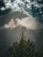 time clouds over the mountains