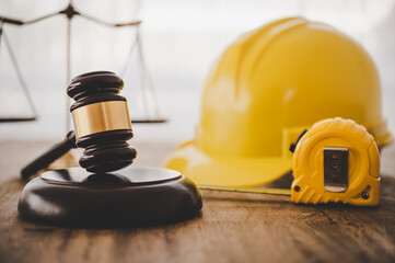 Judge's hammer and helmet Law and Justice about labor law concept Construction law..