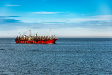 A squid fishing boat sailing in the South Atlantic Ocean