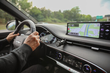 car hand wheel, symbolizing control, navigation, and the driver's connection to the road. Represents power, freedom, and the journey ahead