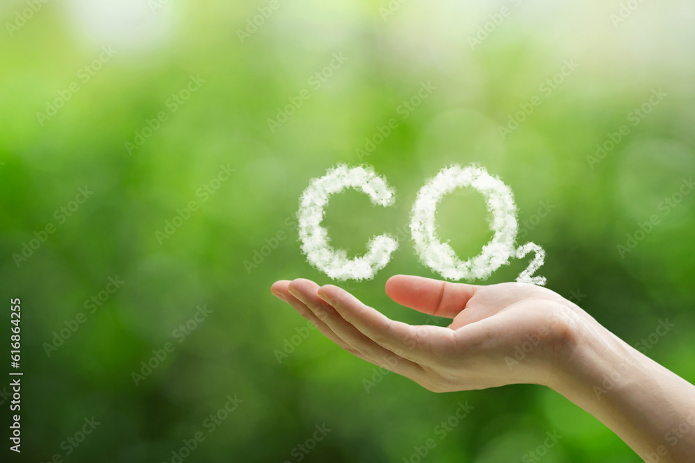 Poster reduce co2 emissions to limit climate change and global warming.co2 white fog in hand ideas for net 
