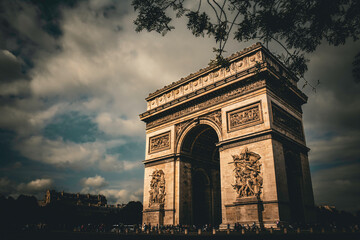 Fototapeta na wymiar The Arc de Triomphe under Dramatic Skies - Paris, France