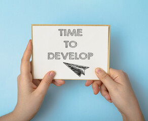 Text on a white sheet Time to develop