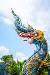 Fototapeta na wymiar The Naga head at Rong Sua Ten temple or Blue temple in Chiang Rai Province, Thailand