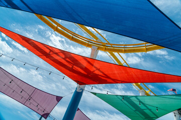 Different shapes add shade from the sun during a hot summer afternoon.