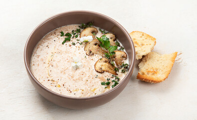 Mushroom cream soup. Healthy vegan dish. Top view.