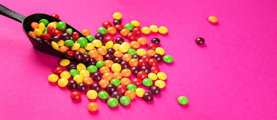 Different colored round candy.